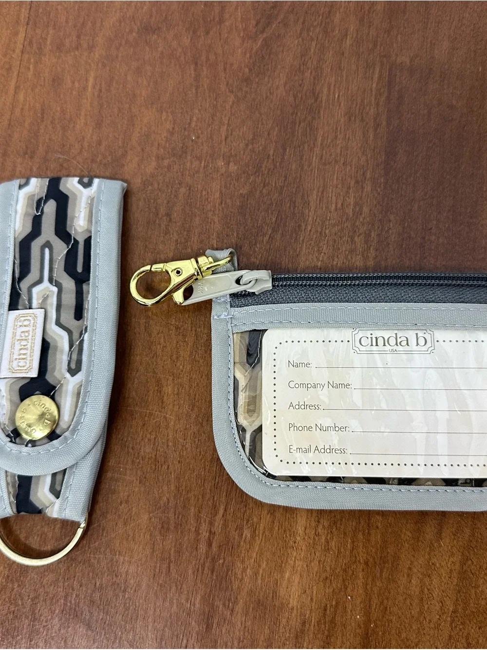 Cinda B Gray and Cream Geometric Wristlet Clutch with Keychain and card holder
